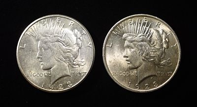 1923-P,S PEACE DOLLARS. BID WITH SILVER CITY AUCTIONS ESTIMATE $80 - $120.