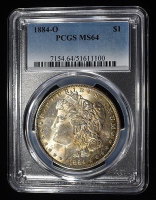 1884-O MORGAN DOLLAR PCGS MS64. CHECK OUT OUR UPCOMING AUCTIONS ESTIMATE $130 - $150.