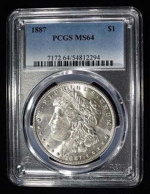 1887 MORGAN DOLLAR PCGS MS64. BID WITH SILVER CITY AUCTIONS ESTIMATE $130 - $150.