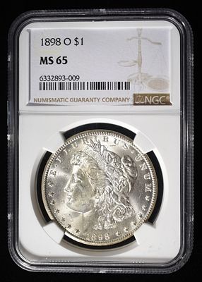 1898-O MORGAN DOLLAR NGC MS 65. CHECK OUT OUR UPCOMING AUCTIONS ESTIMATE $200 - $250.