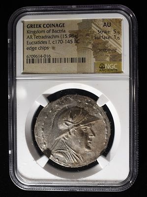170-145 BC EUCRATIDES, AR TETRADRACHM NGC AU. KINGDOM OF BACTRIA, EDGE CHIPS ESTIMATE $2000 - $2500.