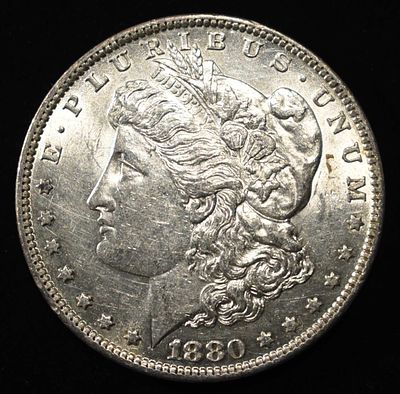1880-O MORGAN DOLLAR AU/BU. WEEKLY COIN & CURRENCY AUCTIONS ESTIMATE $120 - $150.