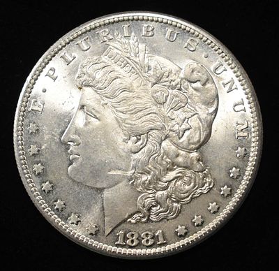1881-S MORGAN DOLLAR BU. BID WITH SILVER CITY AUCTIONS ESTIMATE $75 - $100.