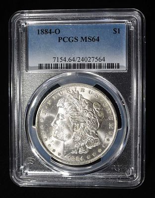 1884-O MORGAN DOLLAR PCGS MS64. TOP RATED AUCTION HOUSE ESTIMATE $100 - $150.