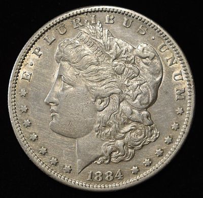 1884-S MORGAN DOLLAR AU. WEEKLY COIN & CURRENCY AUCTIONS ESTIMATE $400 - $500.