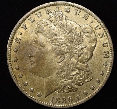 1886-O MORGAN DOLLAR XF+. TOP RATED AUCTION HOUSE ESTIMATE $100 - $130.