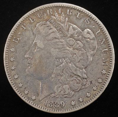 1889-O MORGAN DOLLAR XF. CHECK OUT OUR UPCOMING AUCTIONS ESTIMATE $60 - $80.
