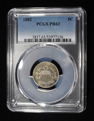 1882 SHIELD NICKEL PCGS PR-63. TOP RATED AUCTION HOUSE ESTIMATE $500 - $600.