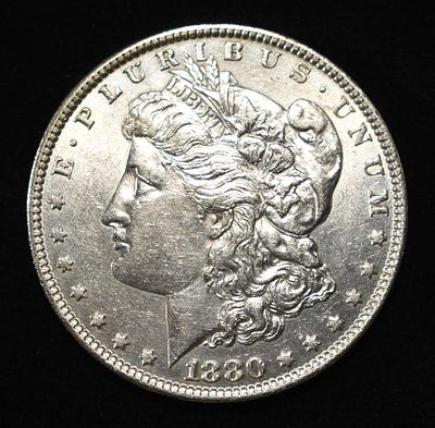 1880-O MORGAN DOLLAR AU/BU. LEADERS IN ON-LINE AUCTIONS ESTIMATE $100 - $130.