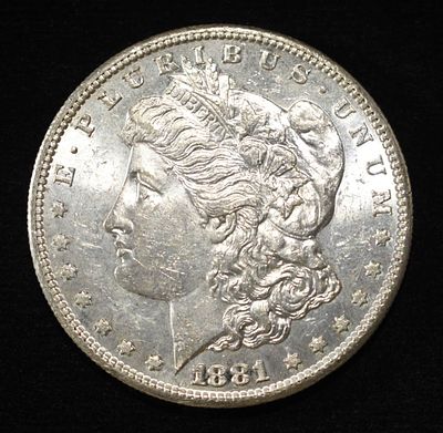 1881-S MORGAN DOLLAR BU. BID WITH SILVER CITY AUCTIONS ESTIMATE $75 - $100.