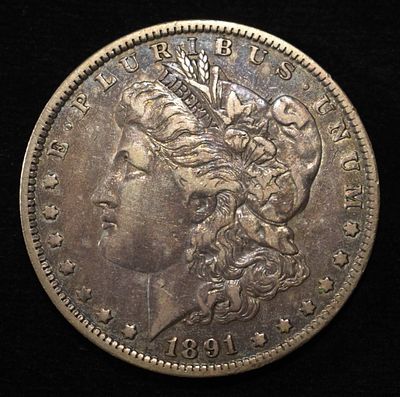 1891-O MORGAN DOLLAR XF. TOP RATED AUCTION HOUSE ESTIMATE $120 - $150.
