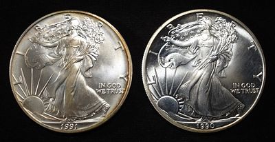 1990 & 1991 AMERICAN SILVER EAGLES. TOP RATED AUCTION HOUSE ESTIMATE $150 - $200.