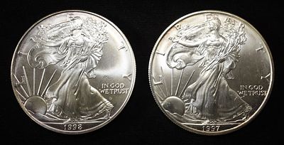 1997 & 1998 AMERICAN SILVER EAGLES. WEEKLY COIN & CURRENCY AUCTIONS ESTIMATE $150 - $200.