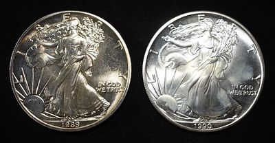 1989 &1990 AMERICAN SILVER EAGLES. LEADERS IN ON-LINE AUCTIONS ESTIMATE $150 - $200.