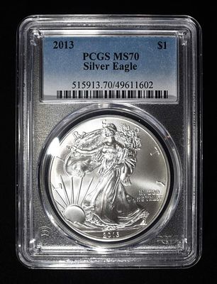 2013 AMERICAN SILVER EAGLE PCGS MS70. CHECK OUT OUR UPCOMING AUCTIONS ESTIMATE $90 - $130.