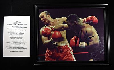 MIKE TYSON SIGNED PHOTO 8X10 FRAMED W/COA. (ALL AUTOGRAPHED ITEMS SOLD AS IS. THERE ARE NO 