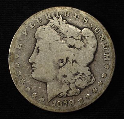 1879-CC MORGAN DOLLAR GOOD. CHECK OUT OUR UPCOMING AUCTIONS ESTIMATE $200 - $250.