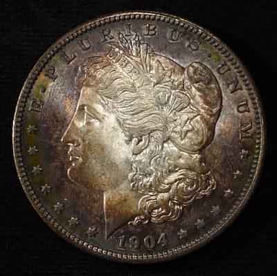 1904-O MORGAN DOLLAR CH/GEM BU COLOR. CHECK OUT OUR UPCOMING AUCTIONS ESTIMATE $300 - $350.