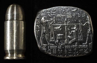 1 OZ SILVER BAR & 1 OZ SILVER BULLET. BID WITH SILVER CITY AUCTIONS ESTIMATE $150 - $200.