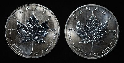 (2) 2013 1 OZ .9999 SILVER CANADA MAPLE ROUNDS. LEADERS IN ON-LINE AUCTIONS ESTIMATE $90 - $110.