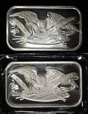 (2) 1 OZ .999 SILVERTOWNE BARS. AMERICAN EAGLE SHIELD & ARMS ESTIMATE $150 - $200.