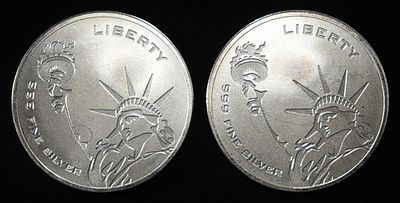 (2) 1 OZ .999 SILVER FREEDOM LIBERTY ROUNDS. TOP RATED AUCTION HOUSE ESTIMATE $150 - $200.