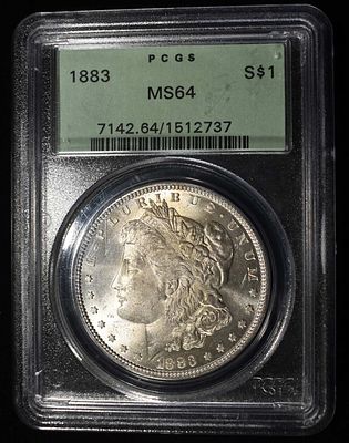 1883 MORGAN DOLLAR PCGS MS-64 OGH. BID WITH SILVER CITY AUCTIONS ESTIMATE $130 - $150.