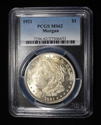 1921 MORGAN DOLLAR PCGS MS-62. TOP RATED AUCTION HOUSE ESTIMATE $100 - $130.