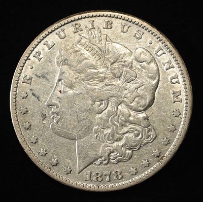 1878-CC MORGAN DOLLAR AU. TOP RATED AUCTION HOUSE ESTIMATE $250 - $300.