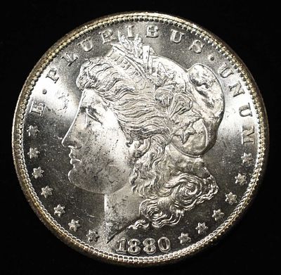 1880-S MORGAN DOLLAR CH BU. CHECK OUT OUR UPCOMING AUCTIONS ESTIMATE $100 - $130.