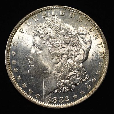 1882-O MORGAN DOLLAR CH BU. BID WITH SILVER CITY AUCTIONS ESTIMATE $100 - $130.