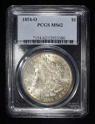 1884-O MORGAN DOLLAR PCGS MS62. BID WITH SILVER CITY AUCTIONS ESTIMATE $100 - $150.