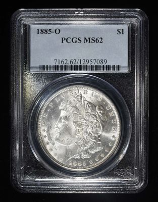 1885-O MORGAN DOLLAR PCGS MS62. LEADERS IN ON-LINE AUCTIONS ESTIMATE $100 - $150.