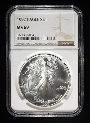 1992 AMERICAN SILVER EAGLE NGC MS69. WEEKLY COIN & CURRENCY AUCTIONS ESTIMATE $100 - $150.