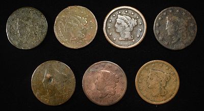 (7) LARGE CENTS. ESTIMATE $100 - $150.