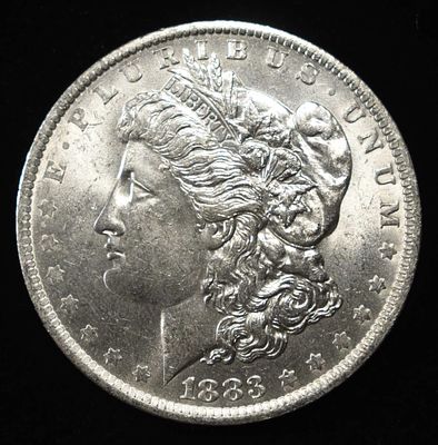 1883-O MORGAN DOLLAR BU. WEEKLY COIN & CURRENCY AUCTIONS ESTIMATE $100 - $130.