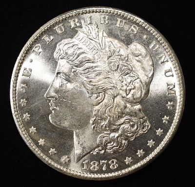 1878-S MORGAN DOLLAR CH BU. CHECK OUT OUR UPCOMING AUCTIONS ESTIMATE $150 - $200.