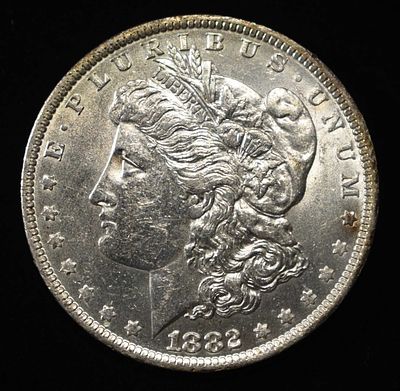 1882-O/S MORGAN DOLLAR AU/BU. TOP RATED AUCTION HOUSE ESTIMATE $200 - $250.