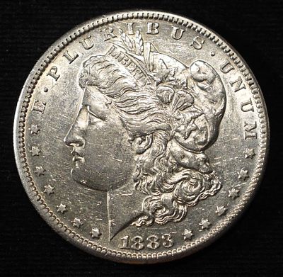 1883-S MORGAN DOLLAR CH AU. LEADERS IN ON-LINE AUCTIONS ESTIMATE $350 - $450.