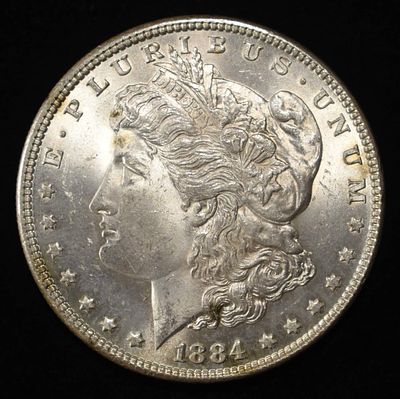1884 MORGAN DOLLAR BU. WEEKLY COIN & CURRENCY AUCTIONS ESTIMATE $130 - $150.