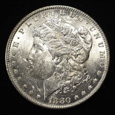 1880-O MORGAN DOLLAR BU. LEADERS IN ON-LINE AUCTIONS ESTIMATE $160 - $200.
