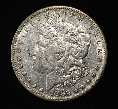 1883-S MORGAN DOLLAR XF. LEADERS IN ON-LINE AUCTIONS ESTIMATE $100 - $130.