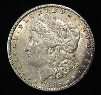 1896-O MORGAN DOLLAR AU. CHECK OUT OUR UPCOMING AUCTIONS ESTIMATE $200 - $250.