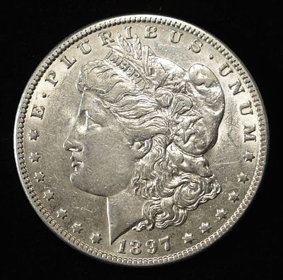 1897-O MORGAN DOLLAR CH AU. LEADERS IN ON-LINE AUCTIONS ESTIMATE $300 - $400.