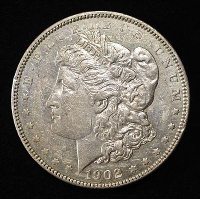 1902 MORGAN DOLLAR CH AU. LEADERS IN ON-LINE AUCTIONS ESTIMATE $100 - $130.