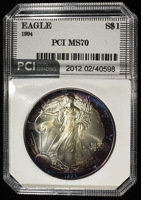 1994 AMERICAN SILVER EAGLE PCI PERFECT GEM BU. CHECK OUT OUR UPCOMING AUCTIONS ESTIMATE $130 - $180.