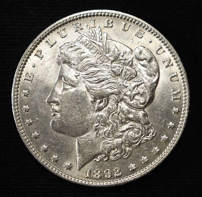 1892 MORGAN DOLLAR CH BU. TOP RATED AUCTION HOUSE ESTIMATE $800 - $900.