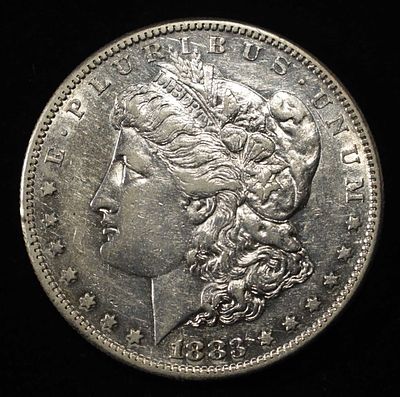 1883-S MORGAN DOLLAR CH AU. WEEKLY COIN & CURRENCY AUCTIONS ESTIMATE $400 - $500.