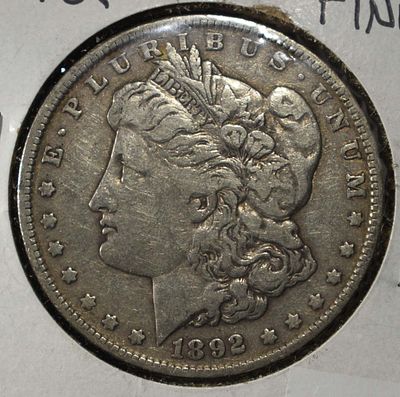1892 MORGAN DOLLAR. WEEKLY COIN & CURRENCY AUCTIONS ESTIMATE $100 - $150.
