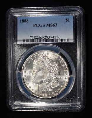 1888 MORGAN DOLLAR PCGS MS63. CHECK OUT OUR UPCOMING AUCTIONS ESTIMATE $160 - $210.